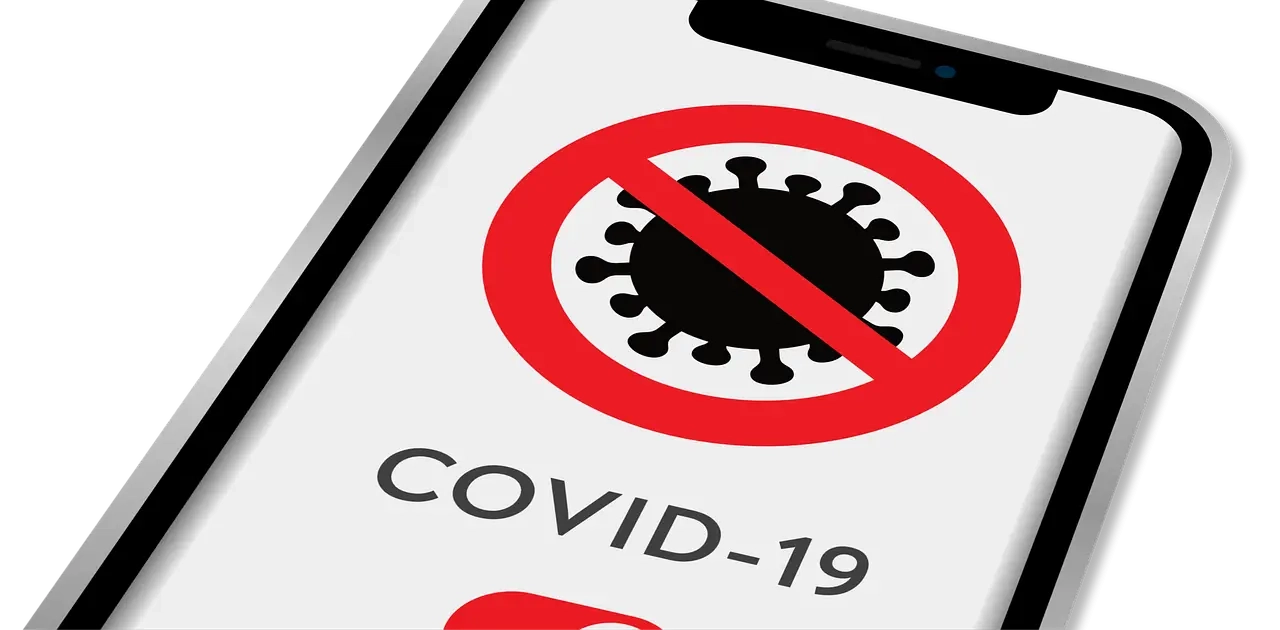 Celular mostrando símbolo de proibido sobre COVID-19. Melhores apps de finanças pessoais gratuitos 2025.